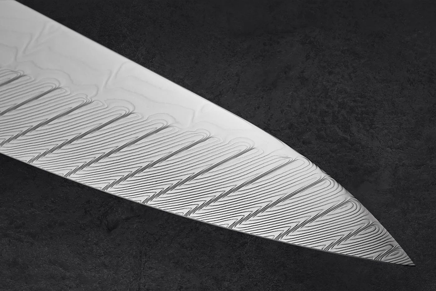 Close view of the wave Damascus pattern on a Shun Shiranami blade
