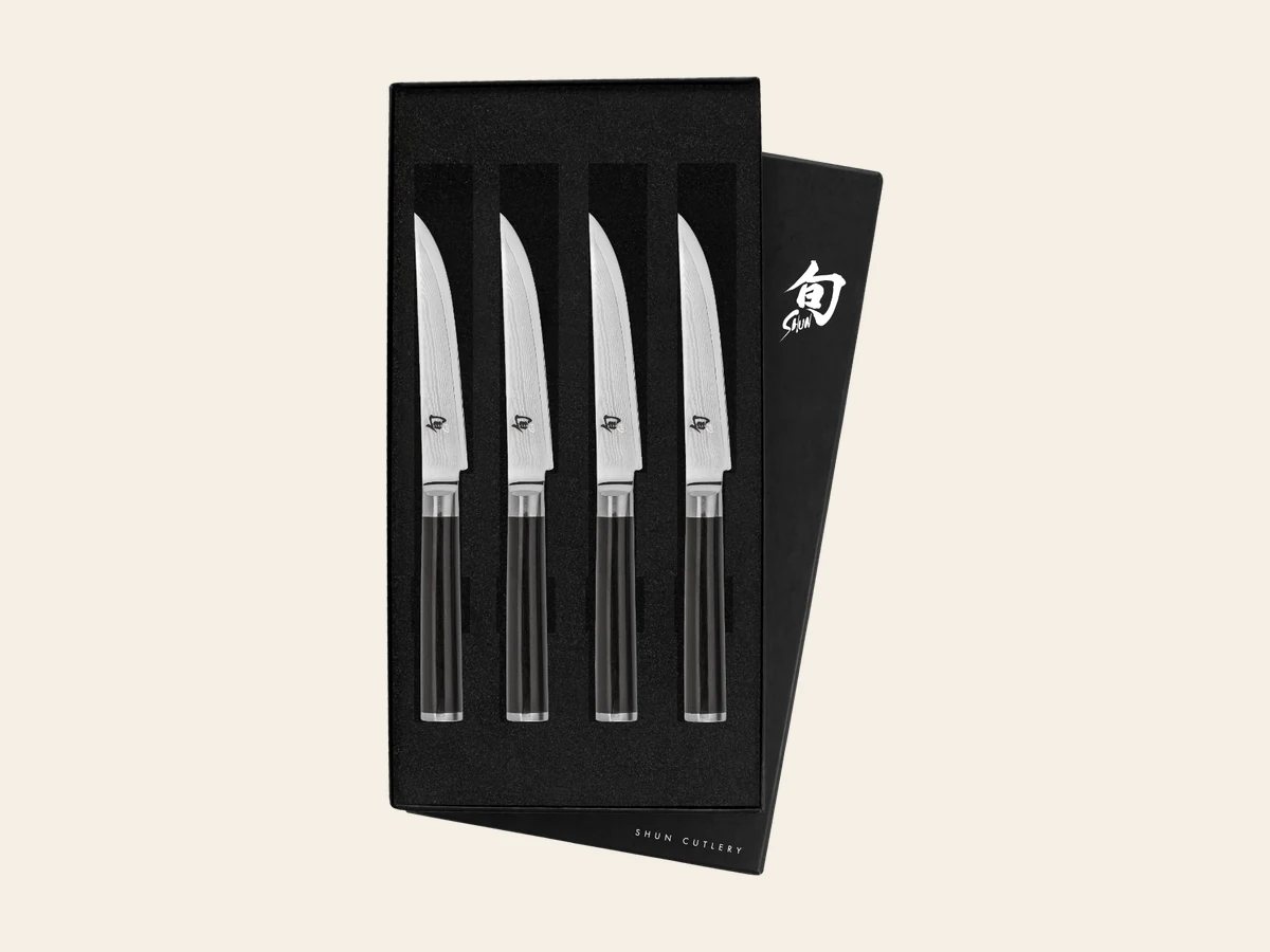 Shun Classic four-piece steak knife set with dark wood handles